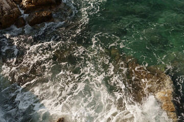 Fresnch Riviera cliffs with sea waves crushing on them