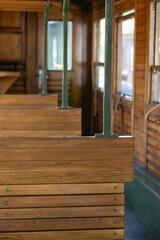 Serenely empty vintage tramcar, wood texture whispers bygone journeys, mirroring nostalgic Yule celebrations and World Heritage Day reveries  Šarganska (sharganska) osmica