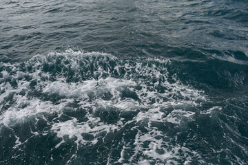 Closeup ocean waves with turquoise water