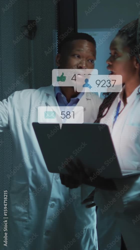 Poster animation of notification bars over diverse engineers discussing on laptop in server room