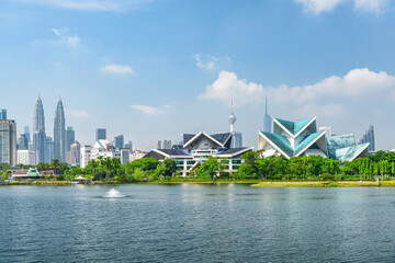 Awesome Kuala Lumpur skyline. Scenic lake and fountains