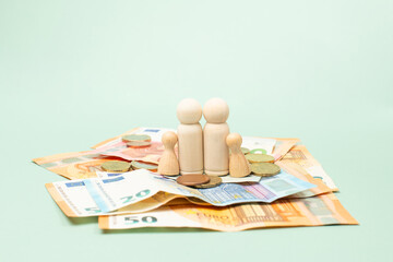 Financial problem for family, poverty, inflation, minimum wage, increase living costs, child benefit, Euro banknotes money