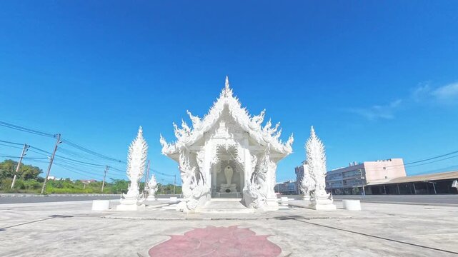 Dannok White Snake Temple is a temple with a beautiful white ordination hall. It stands out with its beautiful stucco art
