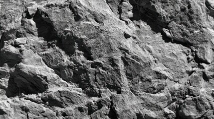 Close-up view of rough gray rock face