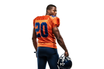 Confident African American Football Player in Orange Uniform Looking Back While Holding Helmet