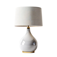 A white ceramic table lamp with a fabric shade and gold accents on a black background in a studio shot