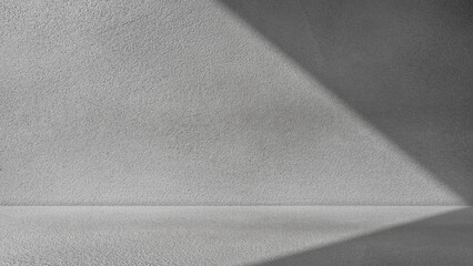 Empty new grey concrete wall room interior studio background and floor with shadow light perspective well editing display products and text on free space cement backdrop