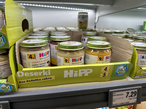 Warsaw, Poland - June 27, 2025: HiPP organic baby food jars displayed on supermarket shelf, showcasing healthy options for infants and toddlers, emphasizing nutrition and quality