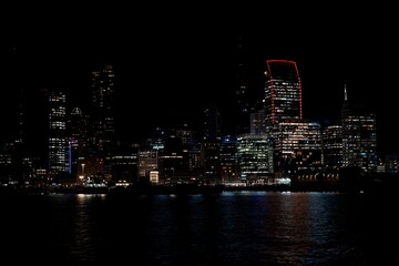 Auckland Skyline from Boat at Night with Dark Sky Tower