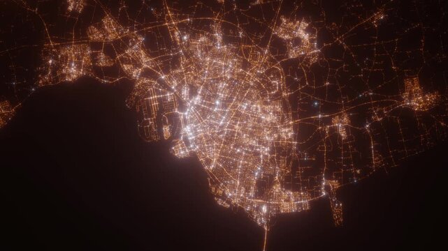 Malmo (Sweden) top view at night. View on modern city from satellite. Camera is zooming in, rotating counterclockwise. Vertical video. The north is on the left side