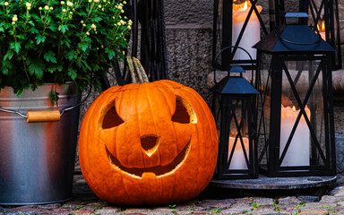 Halloween carved pumpkin. Traditional holiday decorations	