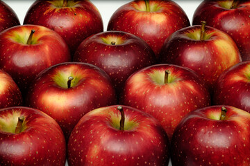close up shot of a group of many freshness red apples with some yellow color marks