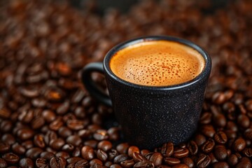 Aromatic coffee cup with creamy foam surrounded by freshly roasted coffee beans delight