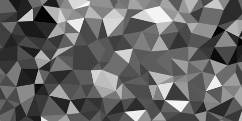 Geometric abstract background featuring a mosaic of grayscale polygons.