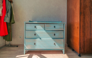 vintage blue stand at the room