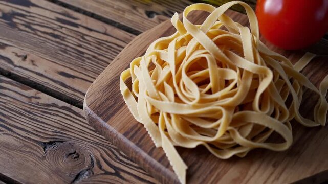 Assorted Ingredients for Preparing Authentic Italian Pasta on Rustic Wooden Table