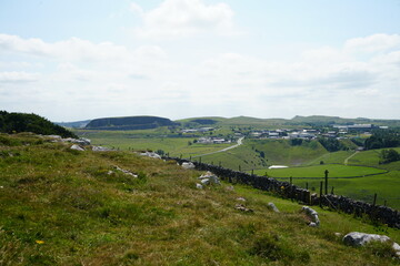 Solomons Temple, The Peak District, England - July 14 2025: Picturesque view of rolling green hills...