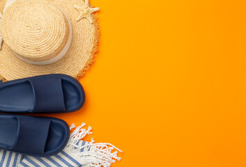 Blue beach accessories on color background, top view. Copy space for text