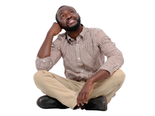 Contemplative Reflection: A focused individual sits in quiet thought, head gently resting on hand, gazing upward with a look of deep thought and inspiration.