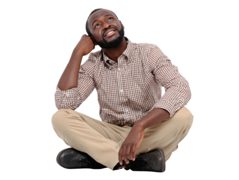 Contemplative Reflection: A focused individual sits in quiet thought, head gently resting on hand, gazing upward with a look of deep thought and inspiration.