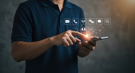 Person using a smartphone with digital icons floating above it against a gray background.