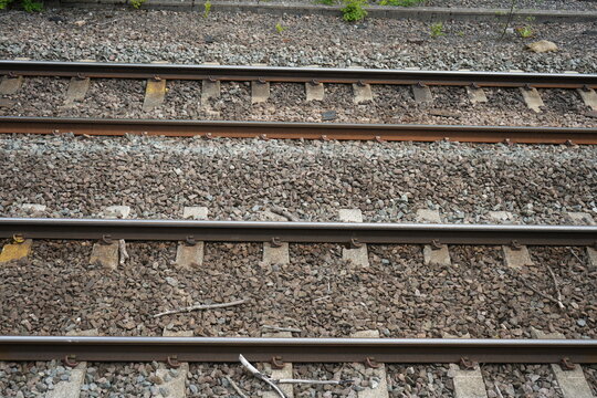 Multiple parallel railway tracks with gravel ballast in Codnor, Derbyshire, England.