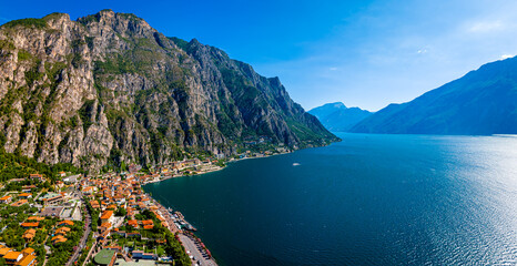 Aerial view of Limone sul Garda, a colorful lakeside town in Italy nestled between Lake Garda and...