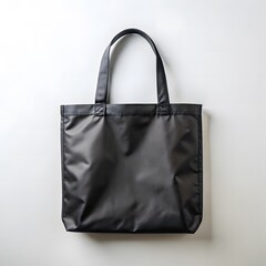 Naklejka premium Black fabric tote bag with black handles black bag