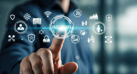 Fototapeta premium ISO 27001 Compliance Concept: Businessman Touching Digital Screen with Information Security Standard Icons for Business Strategy and Data Protection