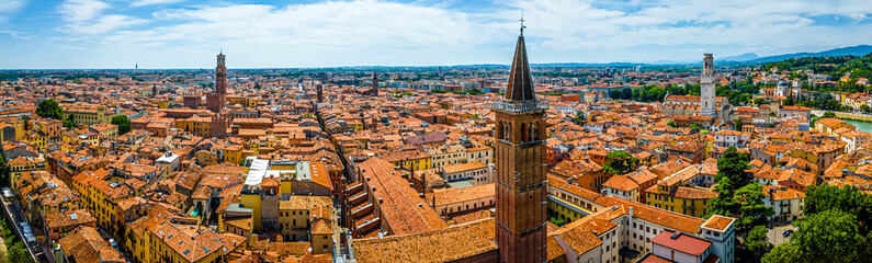 Facade of Basilica di Santa Anastasia in Verona, Italy, with Gothic architecture and brick exterior...