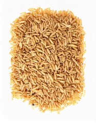 Brown rice grains isolated on white background with shallow depth of field to highlight texture