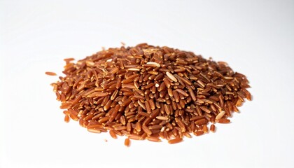 Brown rice grains isolated on white background with shallow depth of field to highlight texture