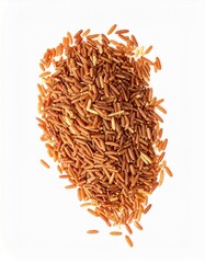 Brown rice grains isolated on white background with shallow depth of field to highlight texture