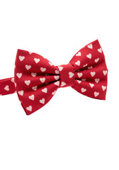 A vibrant deep red fabric bow tie with small white heart patterns outlined in black, smooth silk/satin sheen, perfectly posed on a pure transparent background with copy space, studio product