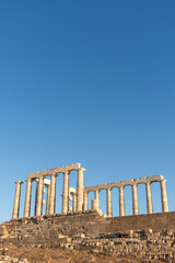 Naklejka premium Temple of Poseidon at Cape Sounion, Greece – Ancient Doric Ruins at Sunset