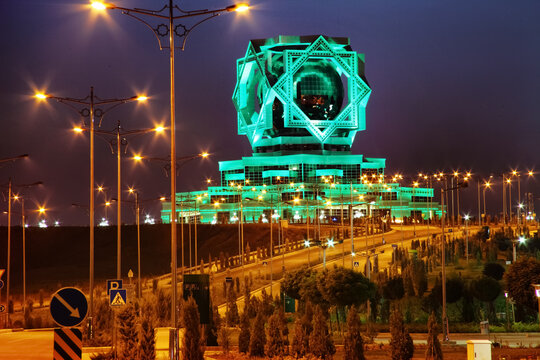 2nd of September 2023. Palace of Weddings in Ashgabat illuminated at night with green lights and symmetrical futuristic design. C.