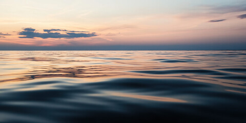 Obraz premium Peaceful Ocean Seascape with Dramatic Clouds and Calm Blue Water Reflecting Sky at Horizon