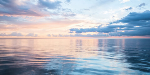 Obraz premium Peaceful Ocean Seascape with Dramatic Clouds and Calm Blue Water Reflecting Sky at Horizon