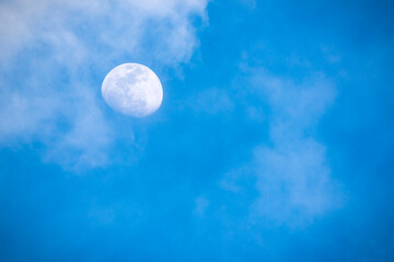 Moon over blue sky
