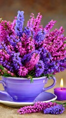 Fototapeta premium Cozy Scandinavian house interior featuring a table, armchair, scented candle, cup of coffee, and flowers for a hygge lifestyle in autumn