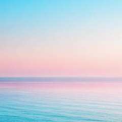 Soft pastel gradient sky over calm ocean water at sunset image