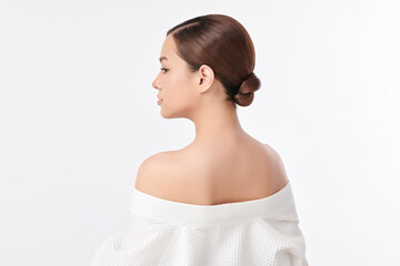 Beautiful young asian woman back view with clean fresh skin on white background, Face care, Facial...