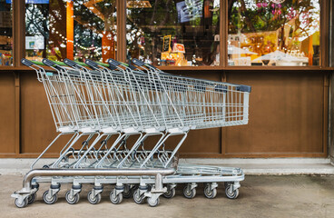Close up Shopping cart at the supermarket. Black friday and Shopping concept