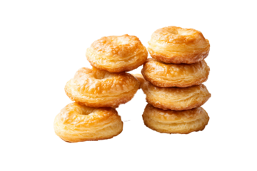 Freshly made mini croissants stacked together, isolated on clean transparent 