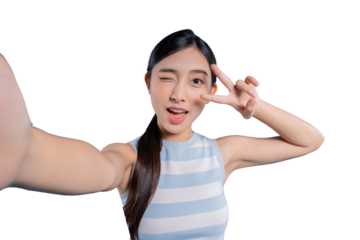 A playful young Asian girl winking and making a V-for-victory or peace sign for a cute and charming selfie.on png  background
