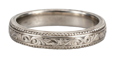 Intricate silver bangle with decorative swirl patterns