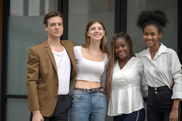 A group of diverse friends standing side by side