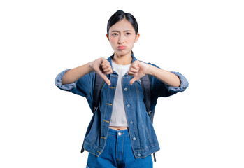 A disappointed young Asian student showing a thumbs-down gesture with both hands, expressing...