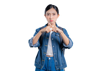 A serious young Asian student making a cross gesture with her fingers to signify 'no', 'wrong', or...
