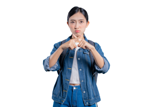 A serious young Asian student making a cross gesture with her fingers to signify 'no', 'wrong', or 'stop'. on png 